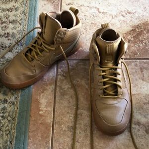 good condition. brown nike size 9.5 used